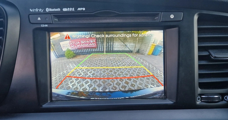 Kia Optima cena 40900 przebieg: 141000, rok produkcji 2013 z Sosnowiec małe 704